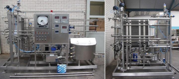 Industrial stainless steel processing equipment in a clean facility.