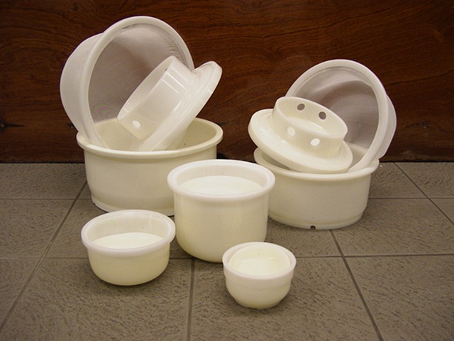 Kadova Gouda cheese molds on the floor