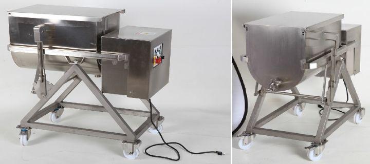 Industrial machine with control panel and cables on metal legs.